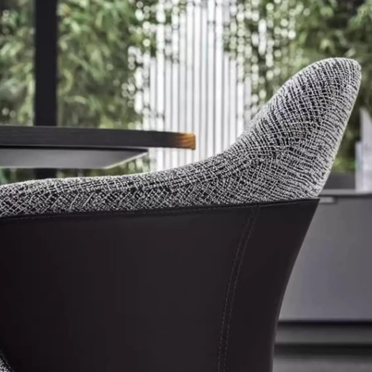 Modern Upholstered Dining Chair with Curved Back and Armrests