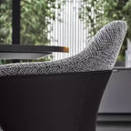 Modern Upholstered Dining Chair with Curved Back and Armrests